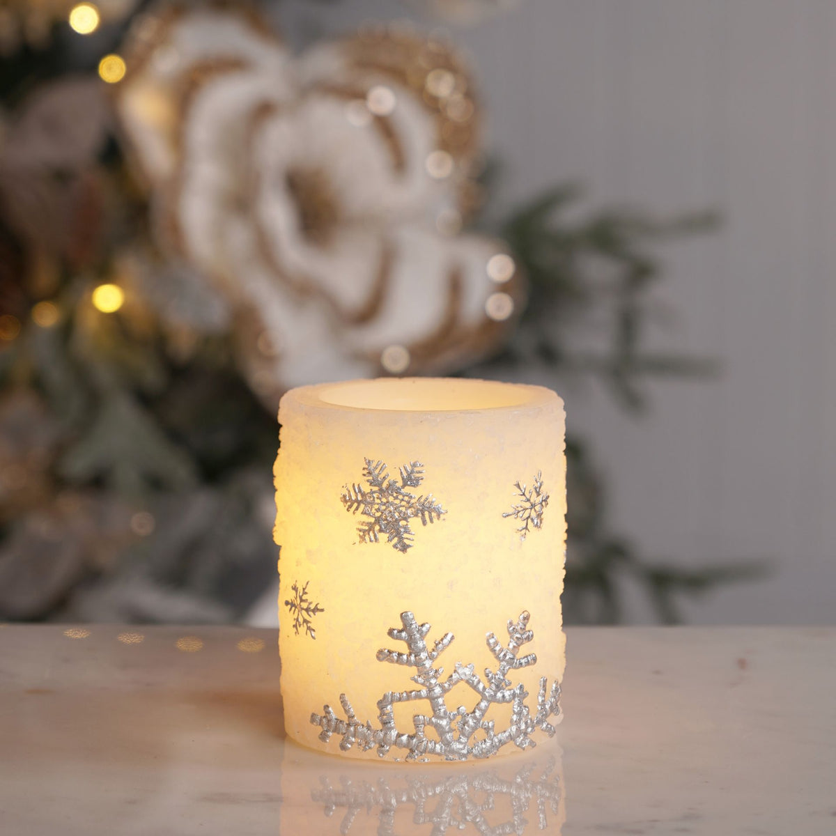 Christmas LED Pillar Candle with Embossed Snowflake 10cm lifestyle