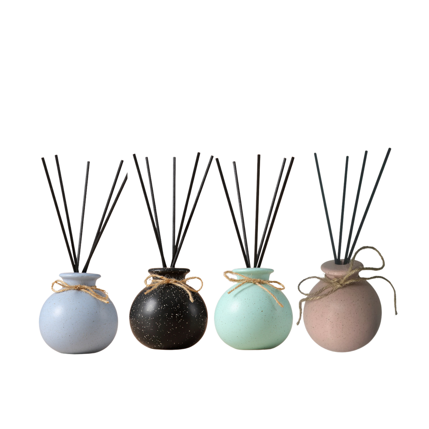 Range Of Pastel Coloured Reed Diffusers Round