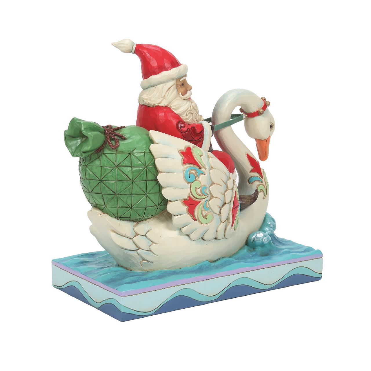Heartwood Creek Santa Riding Swan Figurine