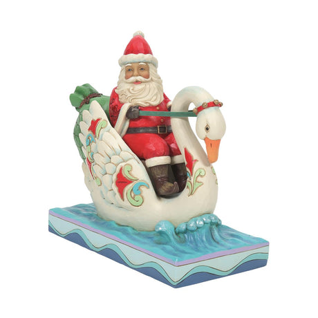 Heartwood Creek Santa Riding Swan Figurine