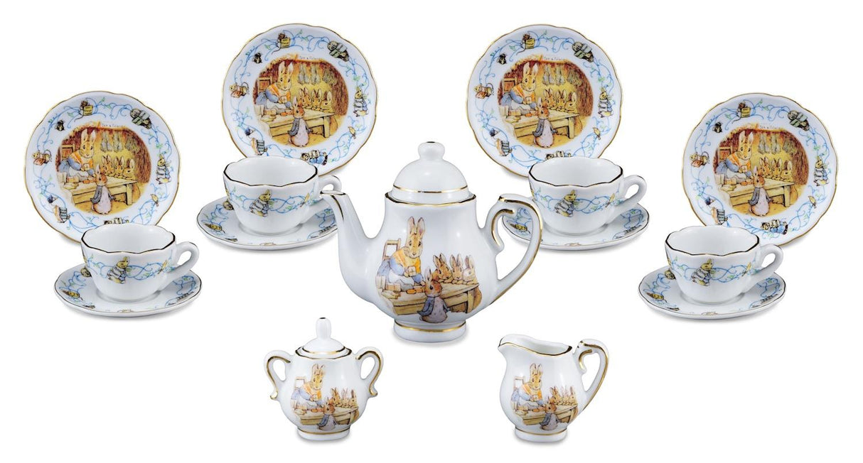 Beatrix Pottr Porcelain Tea Set with illustration of Peter Rabbit & Family set includes 4 teacups and saucers 4 plates teapot milk jug and sugar bowl