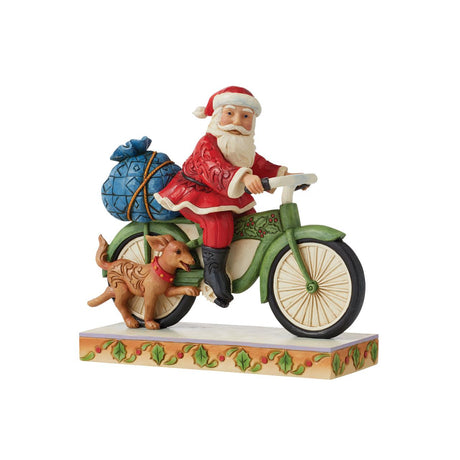 Heartwood Creek Santa Riding Bike Figurine