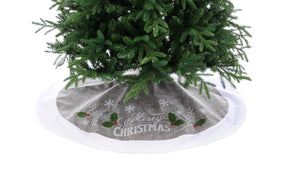 Christmas Tree Skirt in grey with white trim design of Merry Christmas and snowflakes and holly leaves