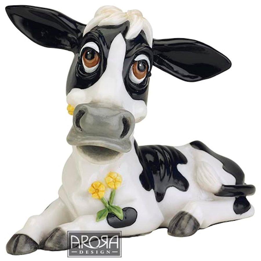 Cow Lying down ornament figurine eating daisies