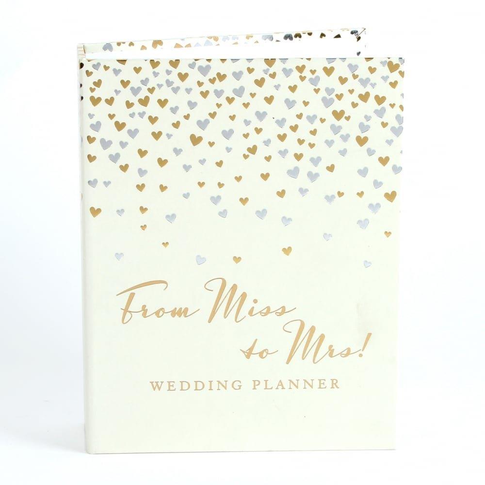 Wedding Planner from Miss to Mrs cover is off white with gold and silver hearts
