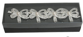 Bow shaped diamante crystal napkin ring holders with pearl in centre set of 4 in box