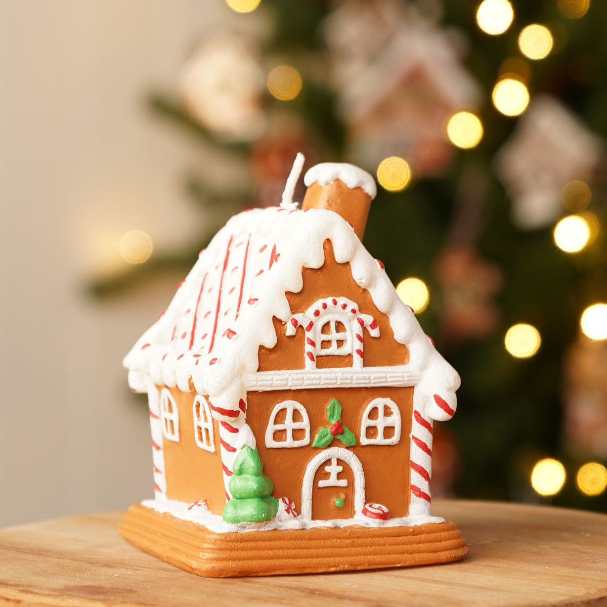 Gingerbread House Shaped Christmas Candle Lifestyle