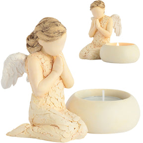 Angel kneeling praying, next to a candle holder