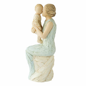 Grandmother with Baby Figurine